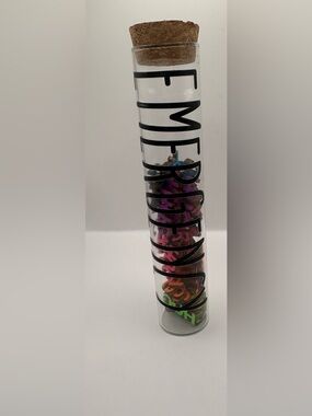 32E - large bottle of neon “emergency hugs”